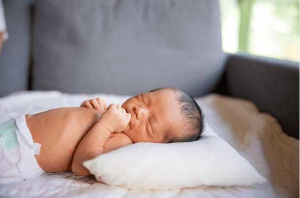 Can a Newborn Sleep on Her Side